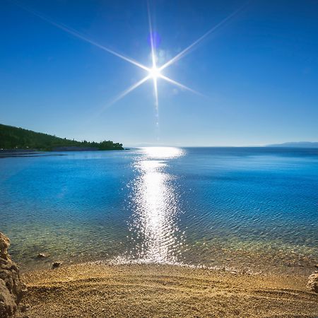 Boutique & Design Hotel Navis Opatija Exterior foto The sun shining on the sea