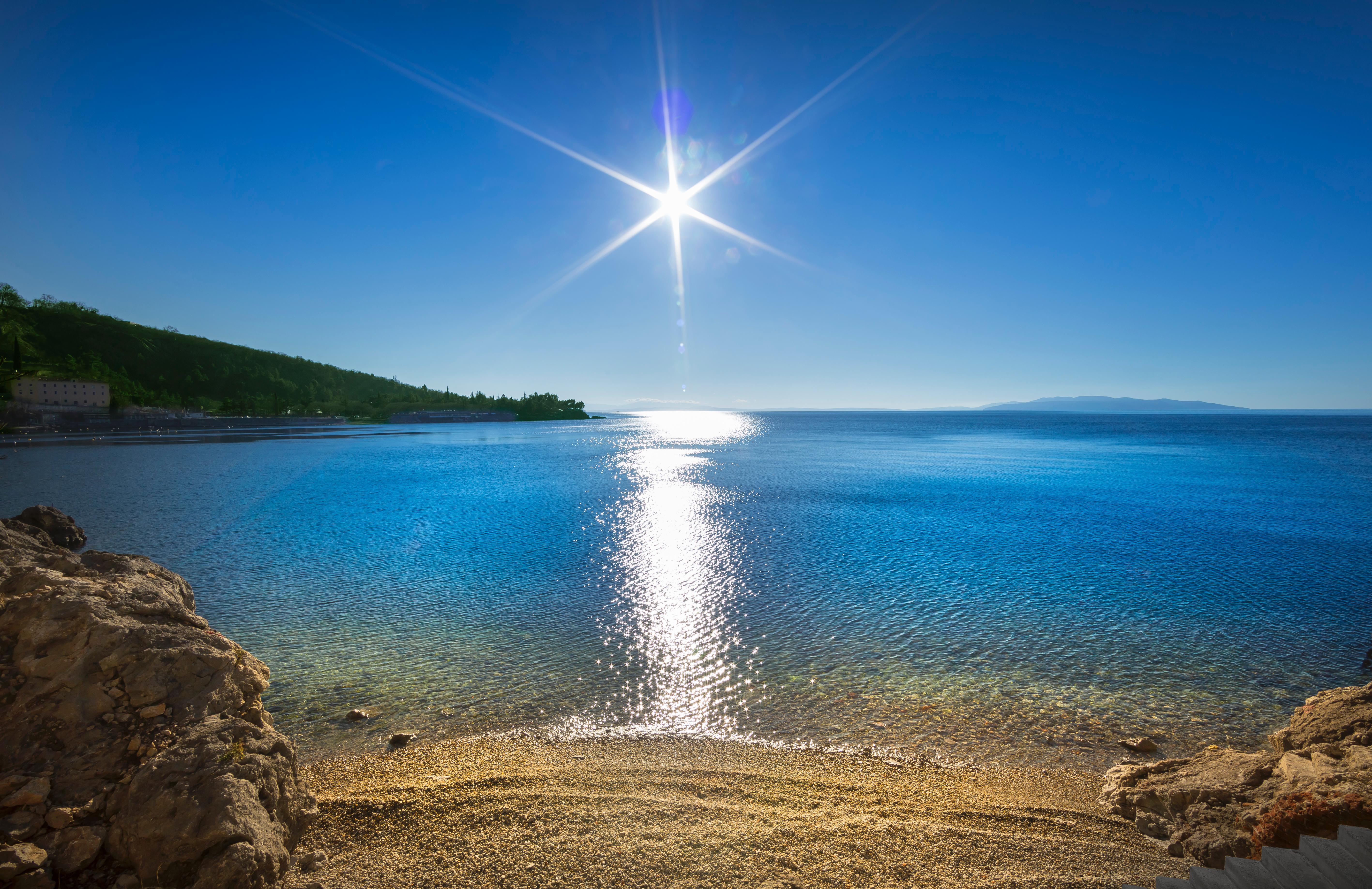 Boutique & Design Hotel Navis Opatija Exterior foto The sun shining on the sea