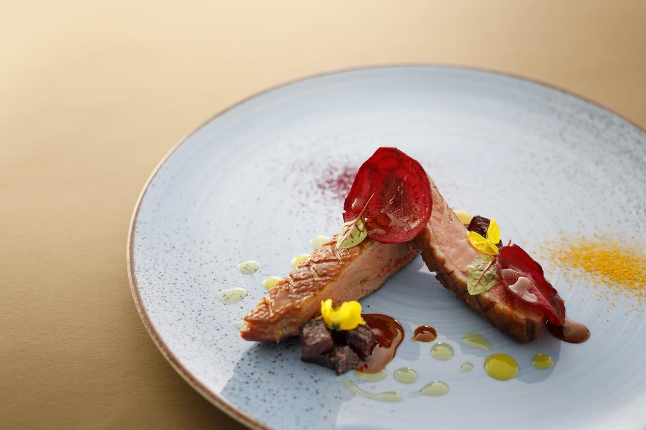 Boutique & Design Hotel Navis Opatija Exterior foto A modern French dish
